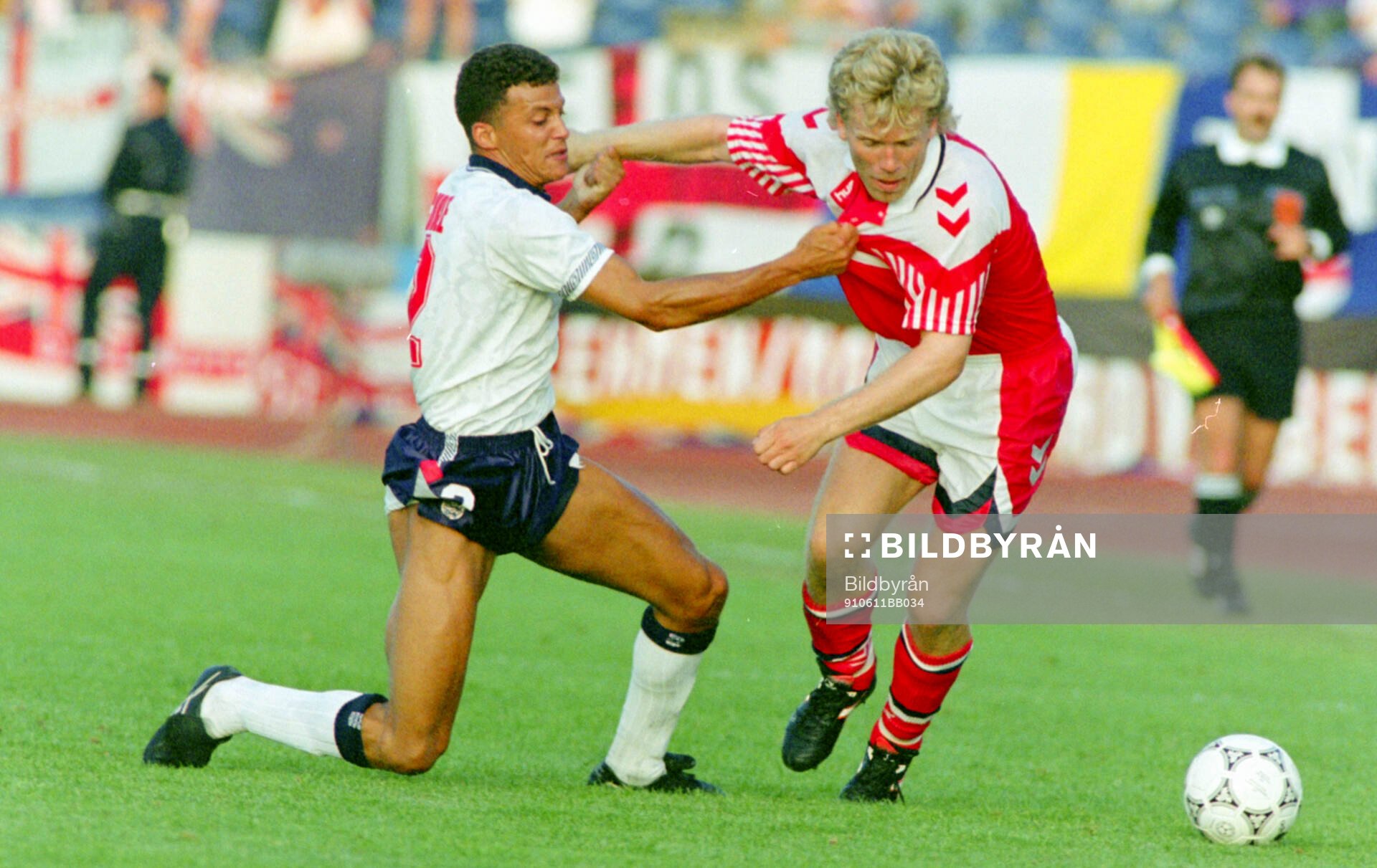 Denmarks Henrik Andersen (R) against Englands Keith Curle