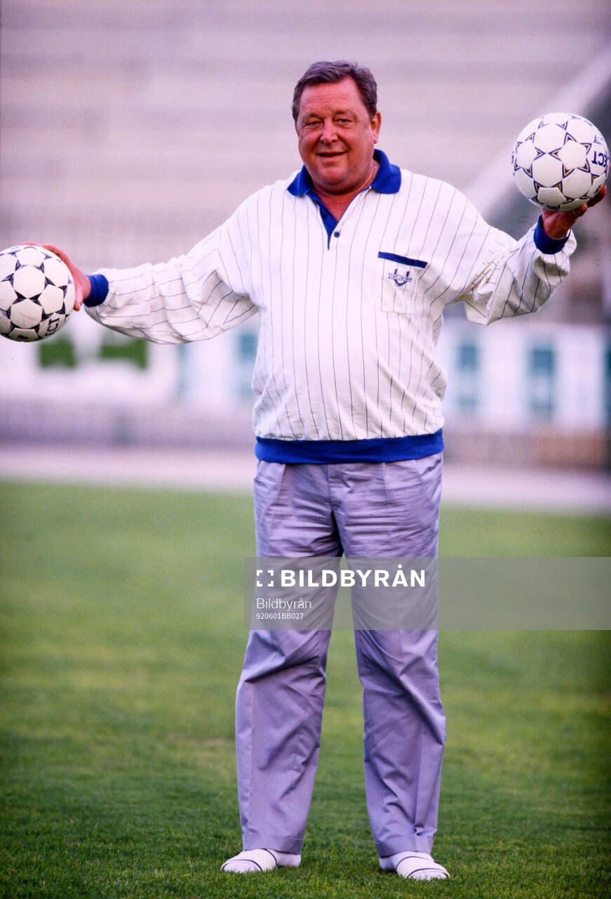 Lennart Johansson, president, UEFA, holding two footballs