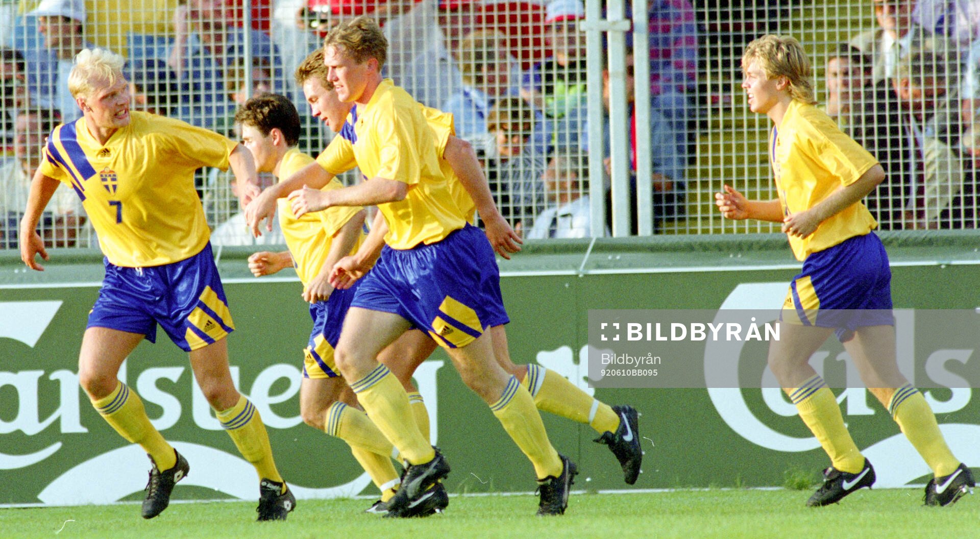 Swedens goalscorer Jan Eriksson (2nd from R) celebrates his