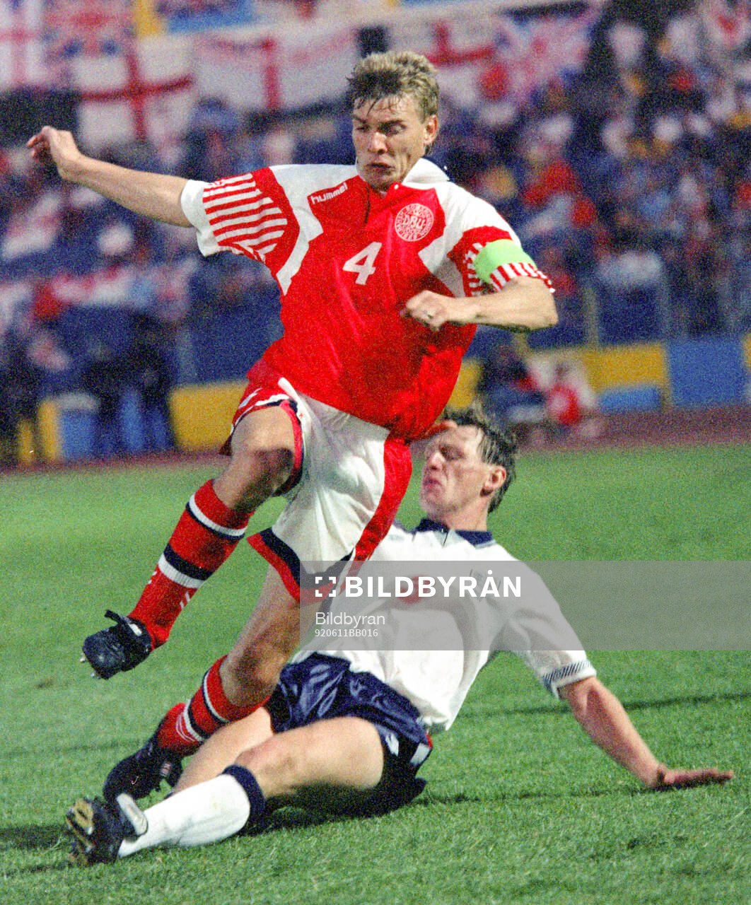 Denmarks Lars Olsen against Englands Stuart Pearce