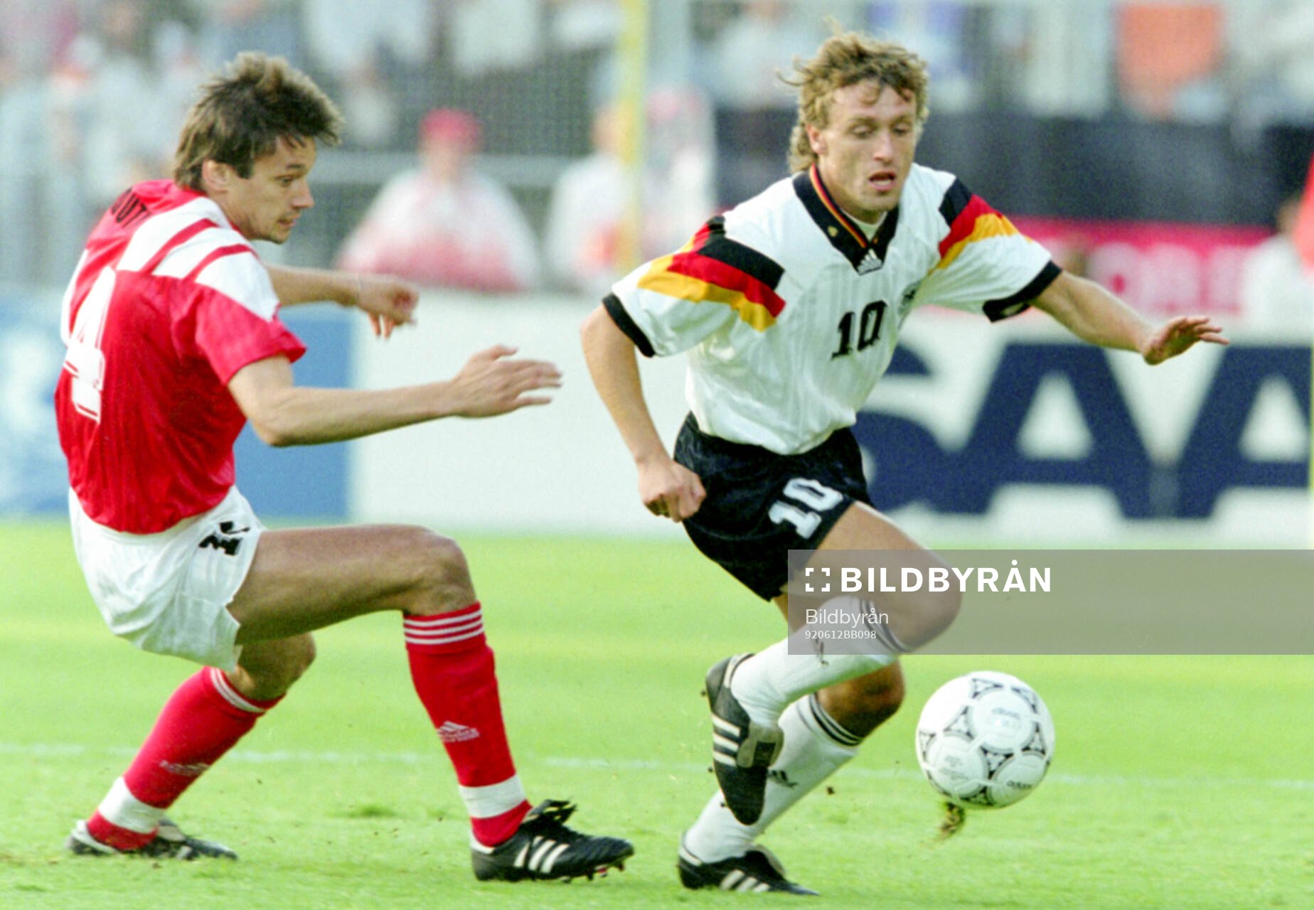 Germanys Thomas Doll against Vladimir Liotyi of CIS