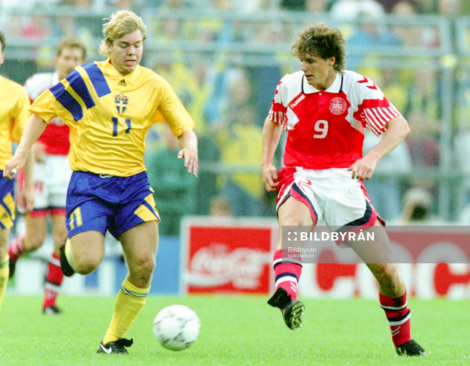 Swedens Tomas Brolin against Denmarks Flemming Povlsen