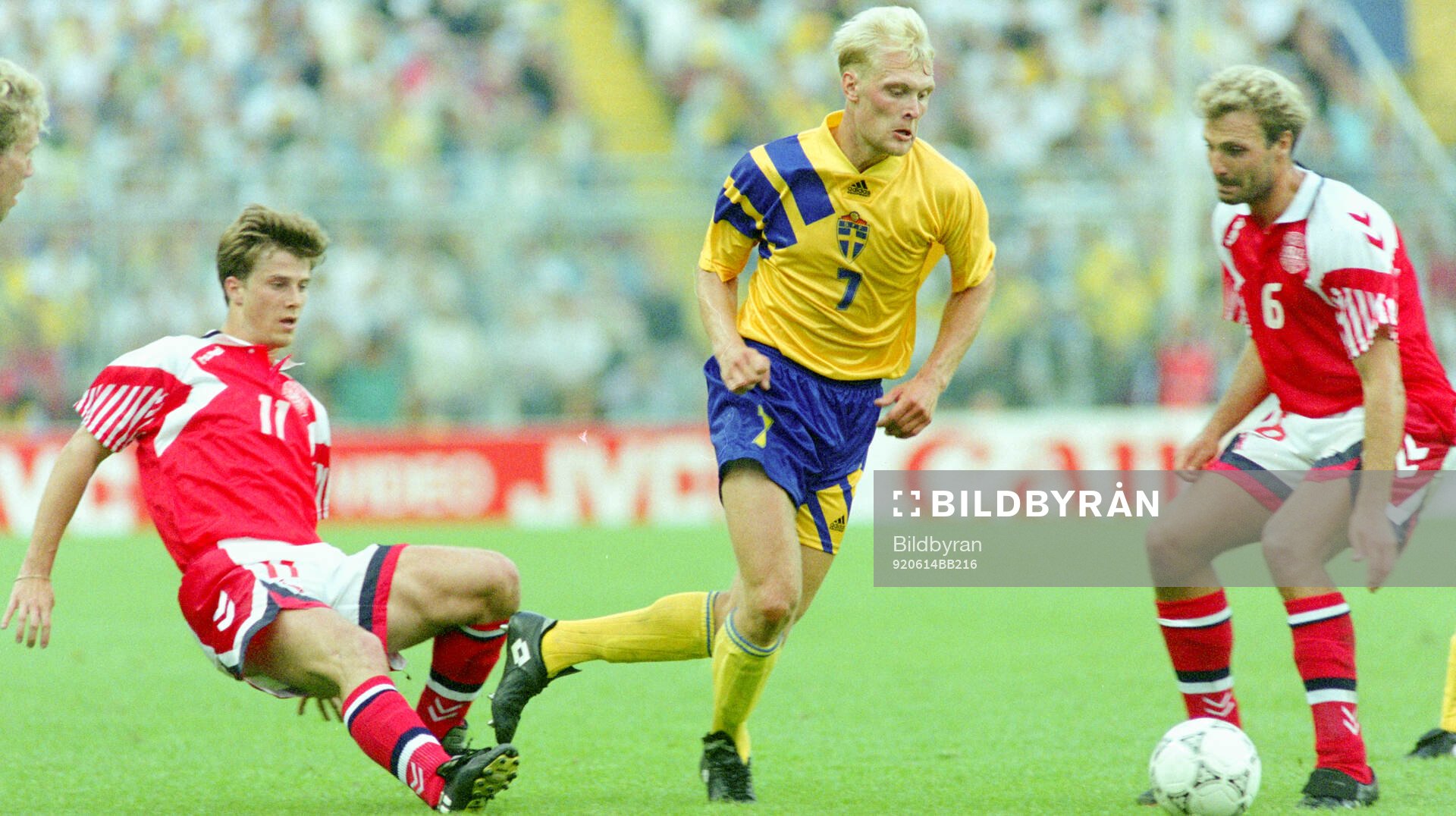 Swedens Klas Ingesson against Denmarks Brian Laudrup (L)