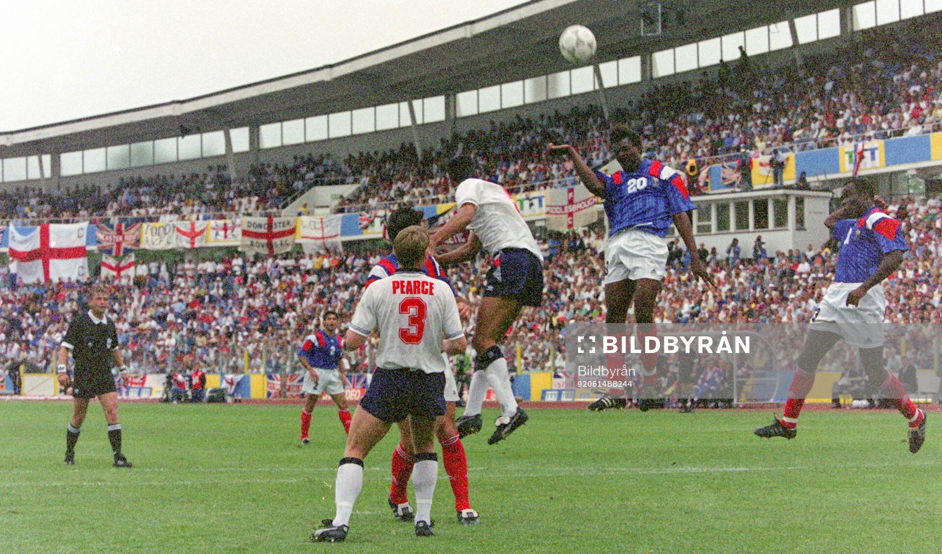 France’s Jocelyn Angloma heads the ball