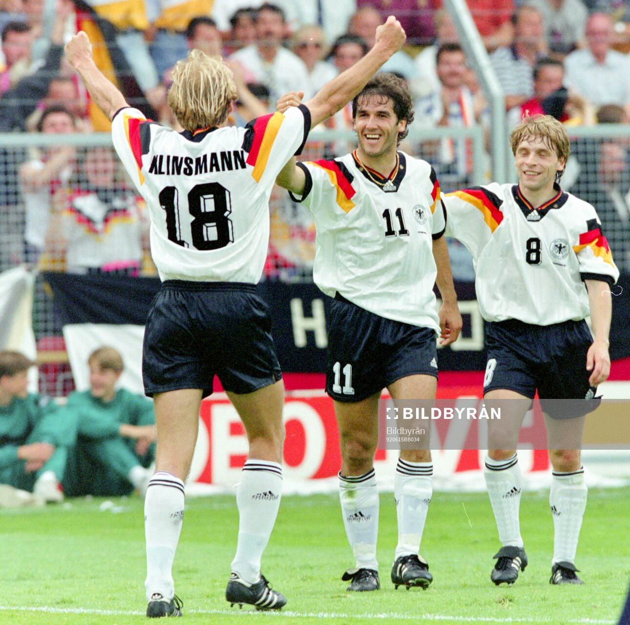 Germanys Karl-Heinz Riedle (C) celebrates his 1-0 goal with