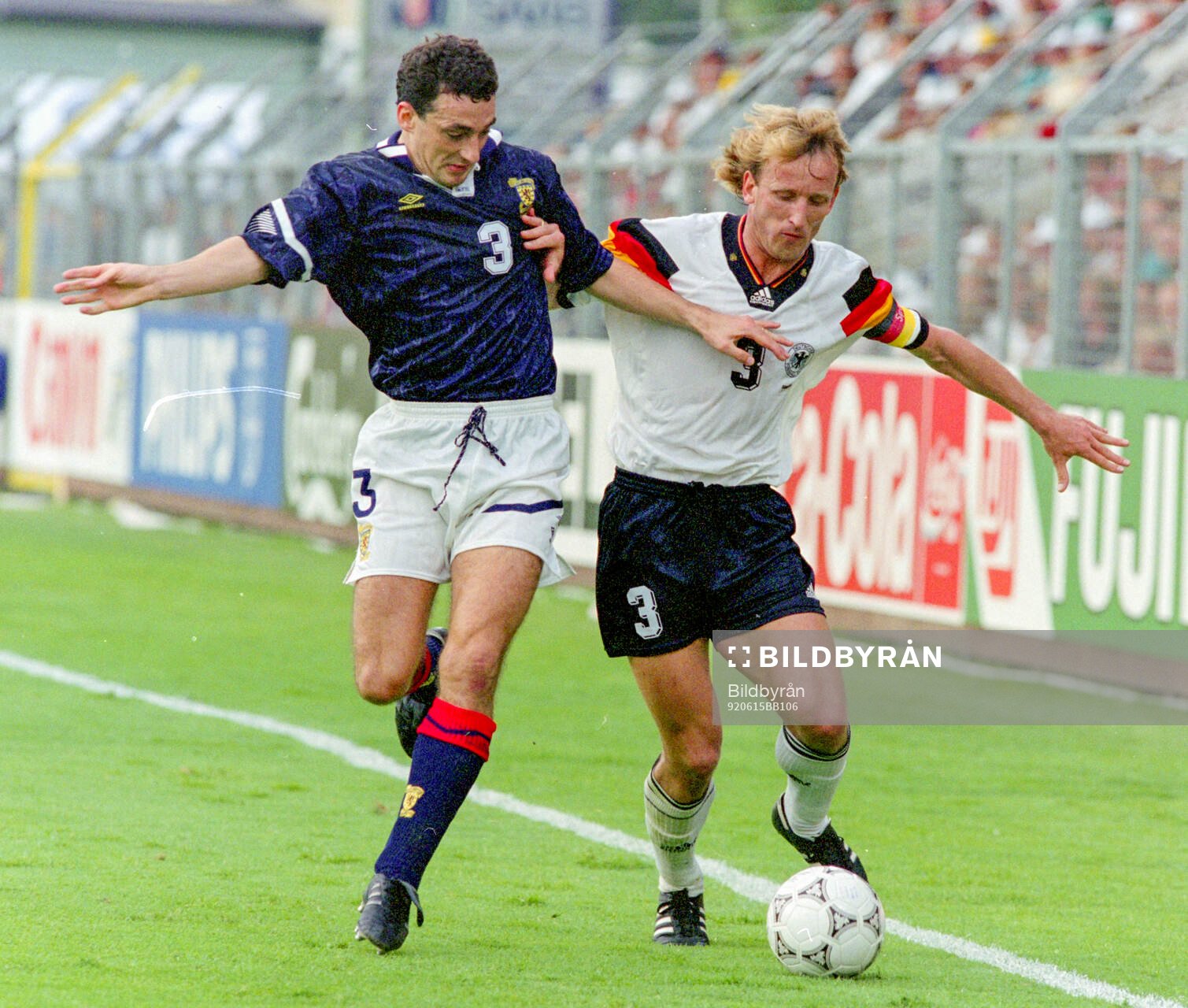 Scotlands Paul McStay against Germanys Andreas Brehme
