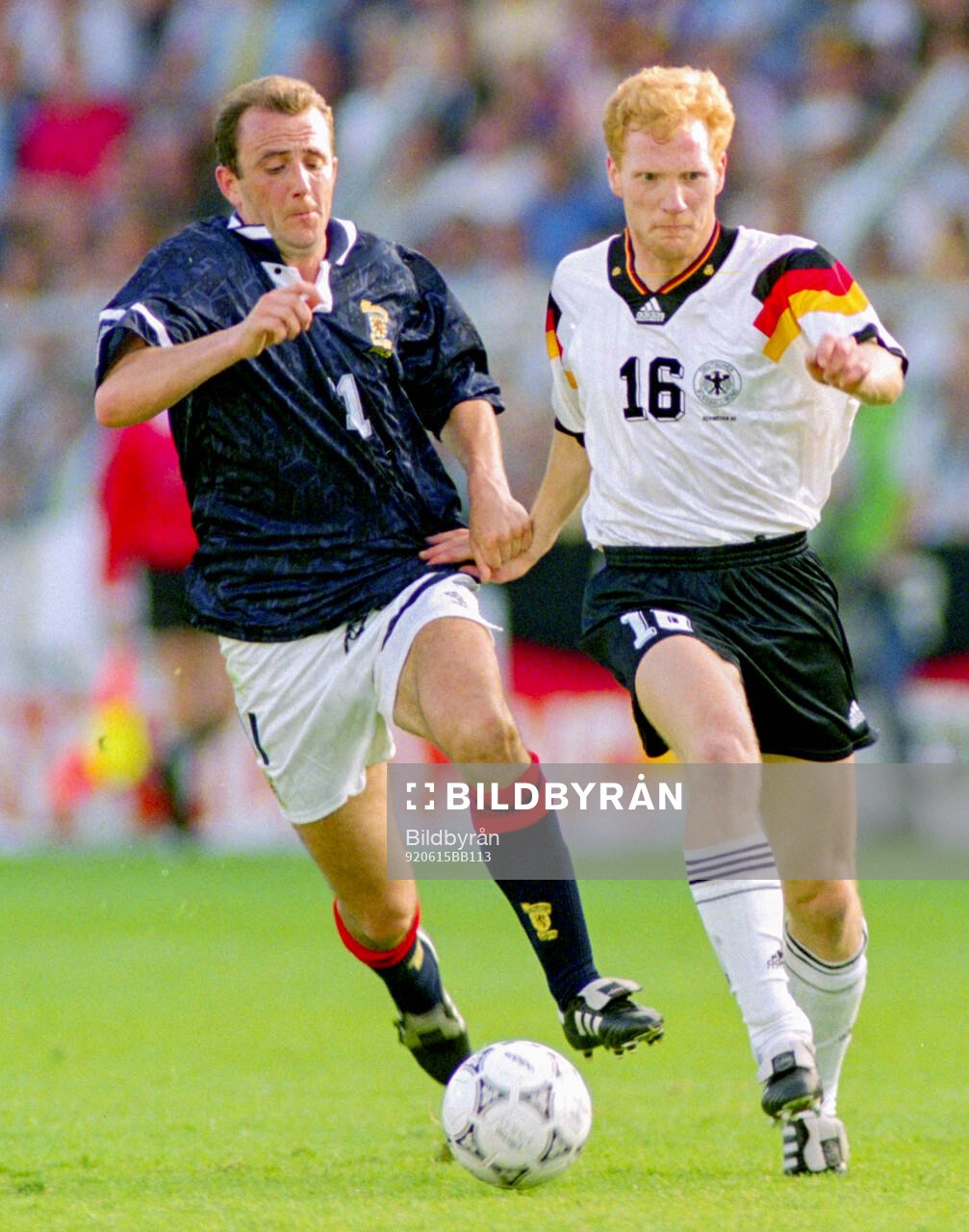 Scotlands Gary McAllister against Germanys Matthias Sammer