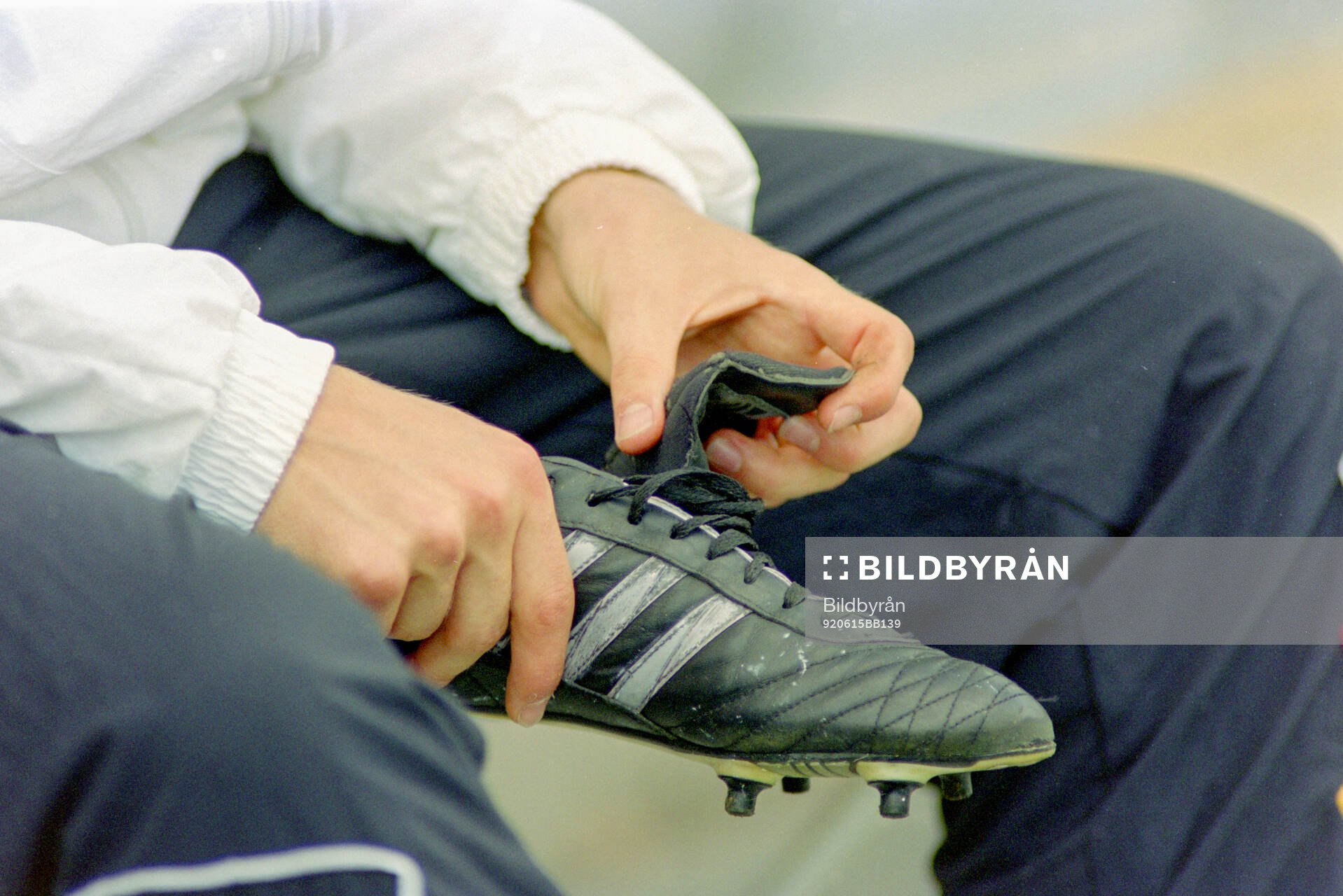 A german player checks his adidas football boot