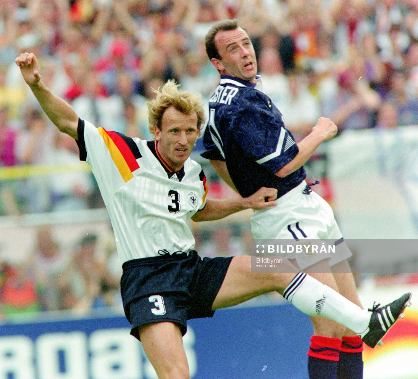 Germanys Andreas Brehme against Scotlands Gary McAllister