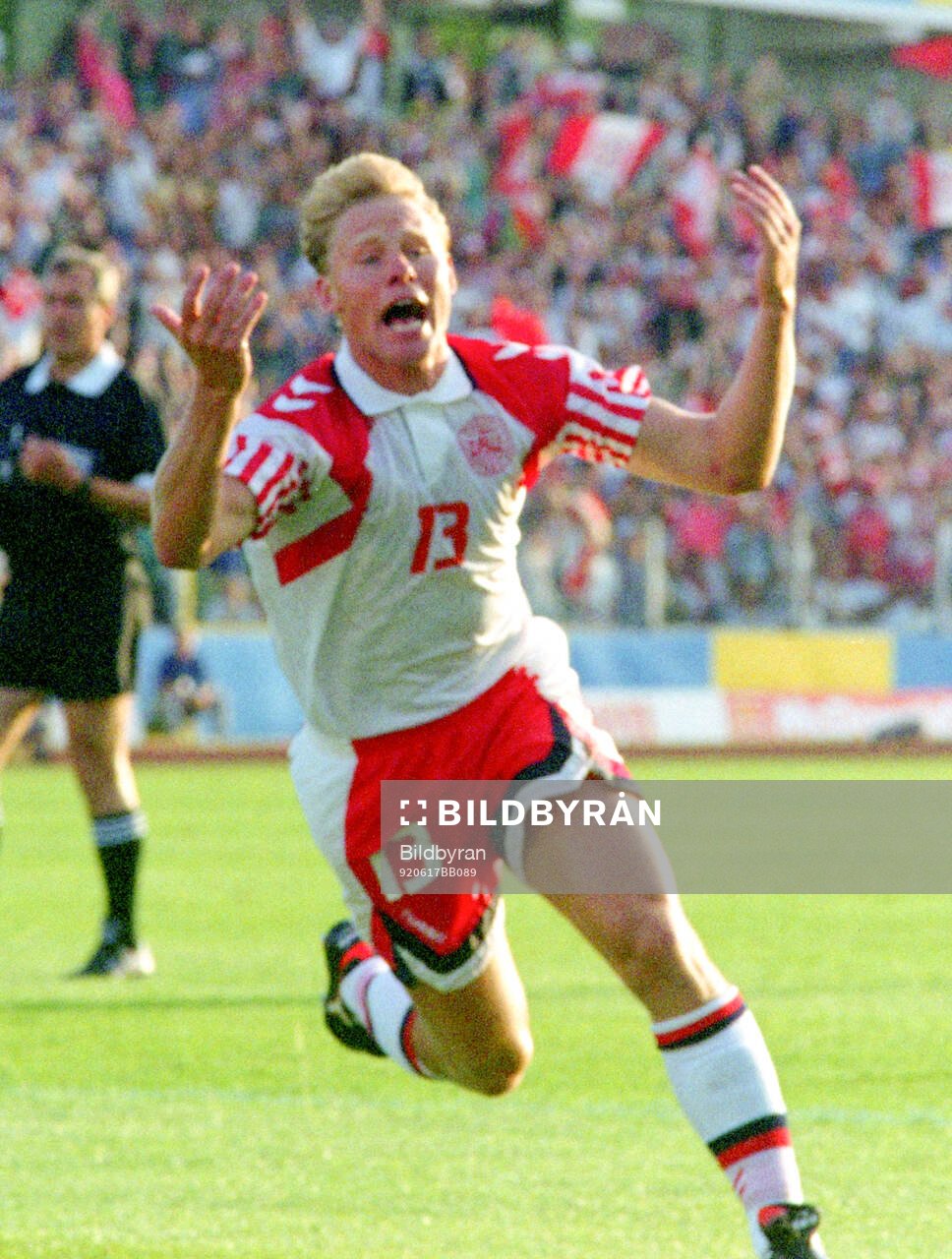 Denmarks Henrik Larsen celebrates his 1-0 goal