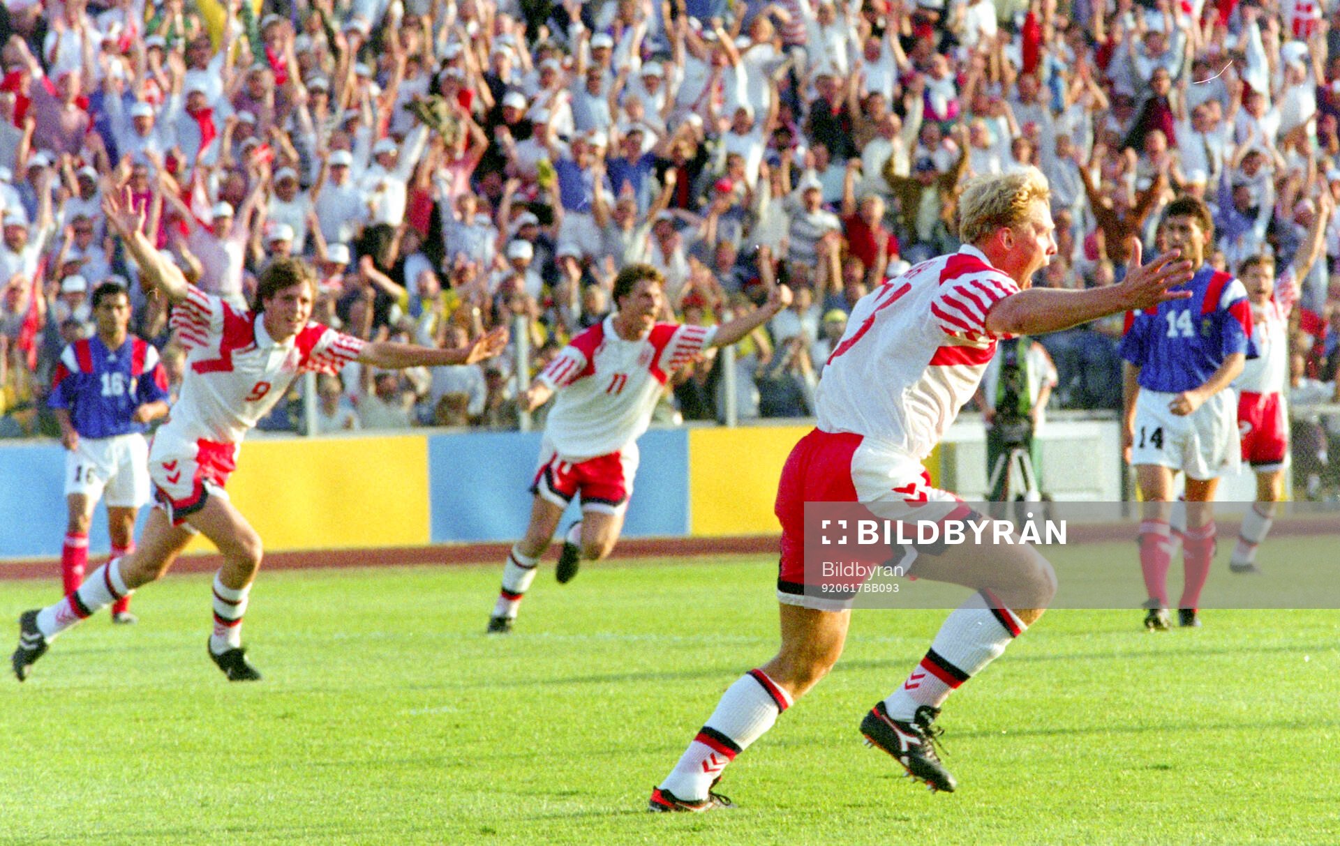 Denmarks Henrik Larsen celebrates his 1-0 goal