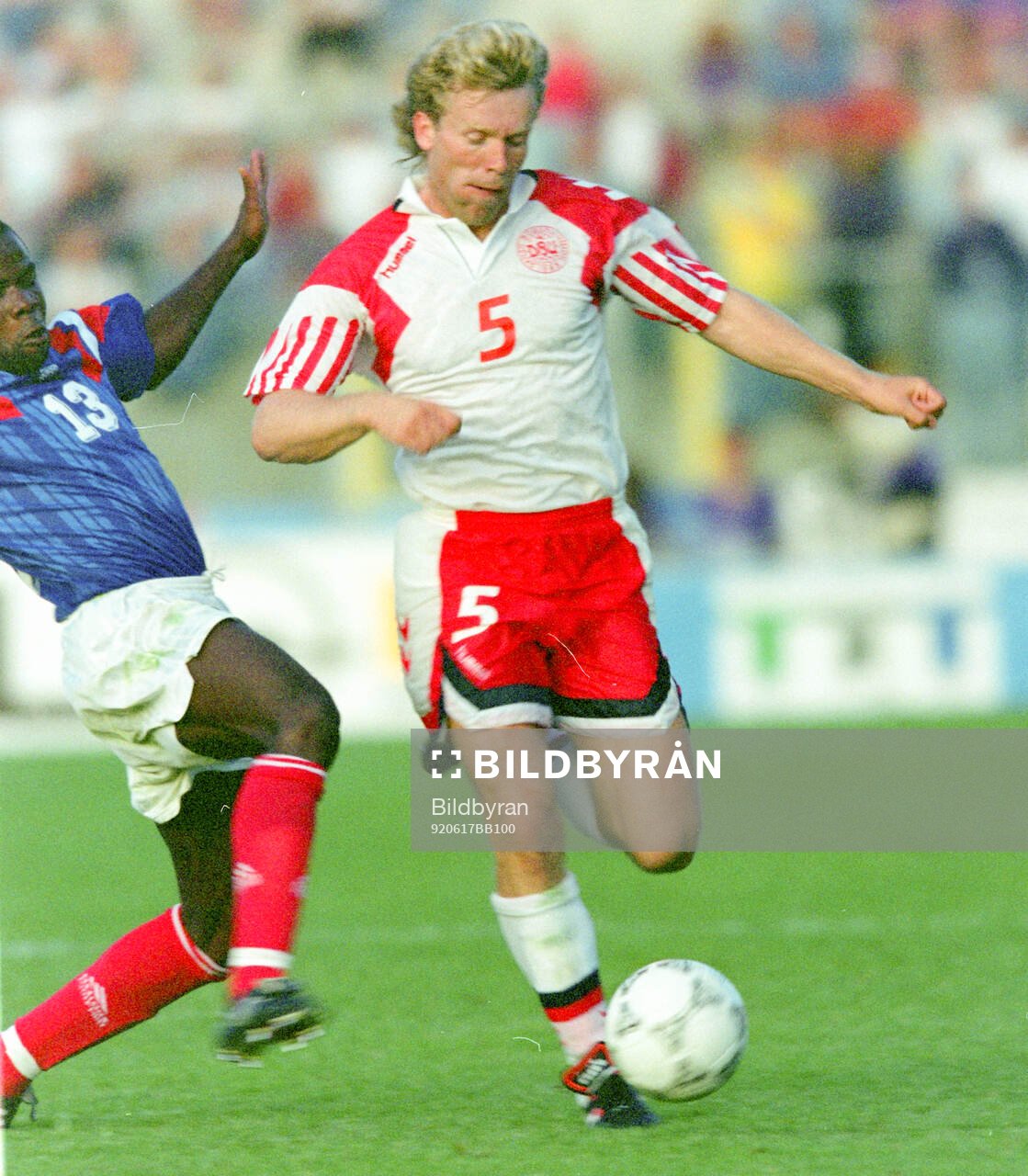 Denmarks Henrik Andersen against France‚Äôs Basile Boli