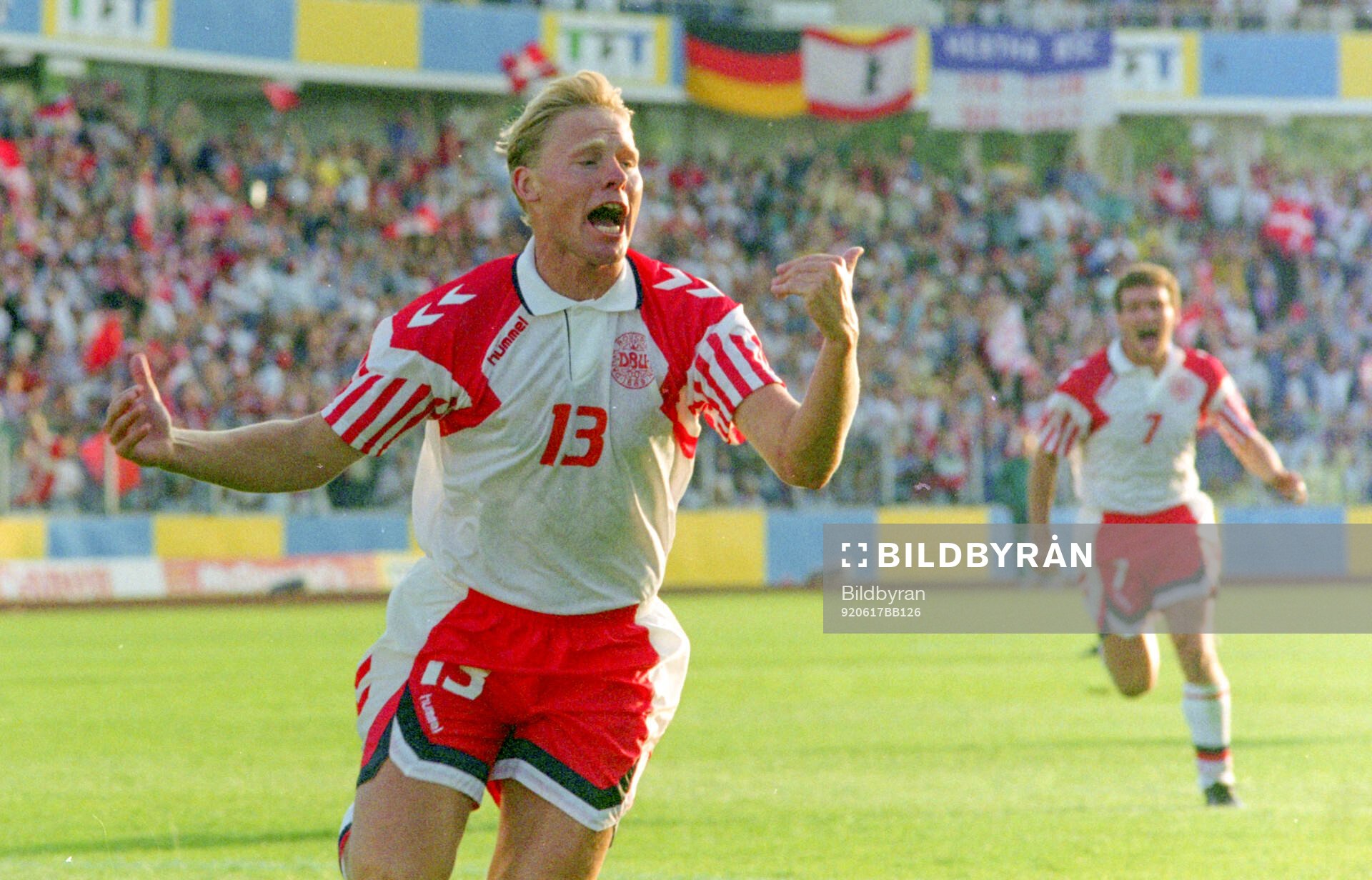 Denmarks Henrik Larsen celebrates his 1-0 goal