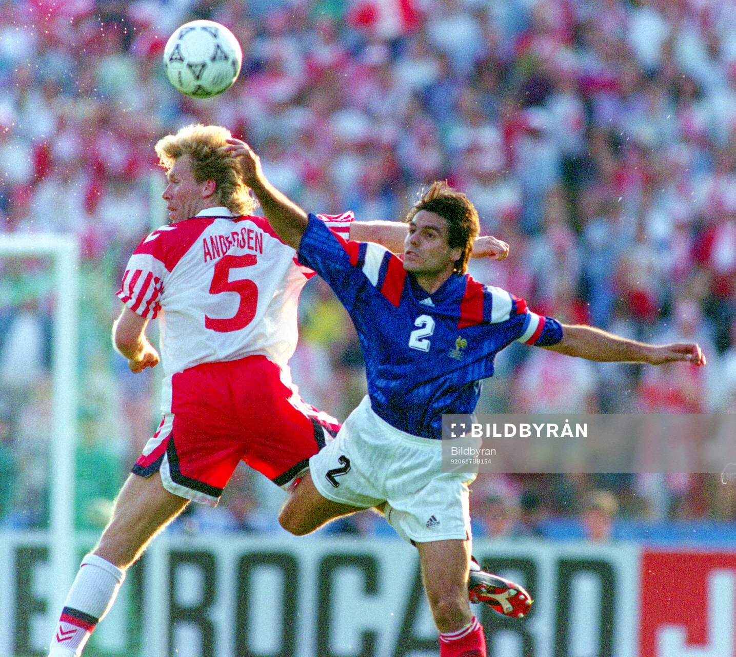 Denmarks Henrik Andersen (L) against Manuel Amoros of