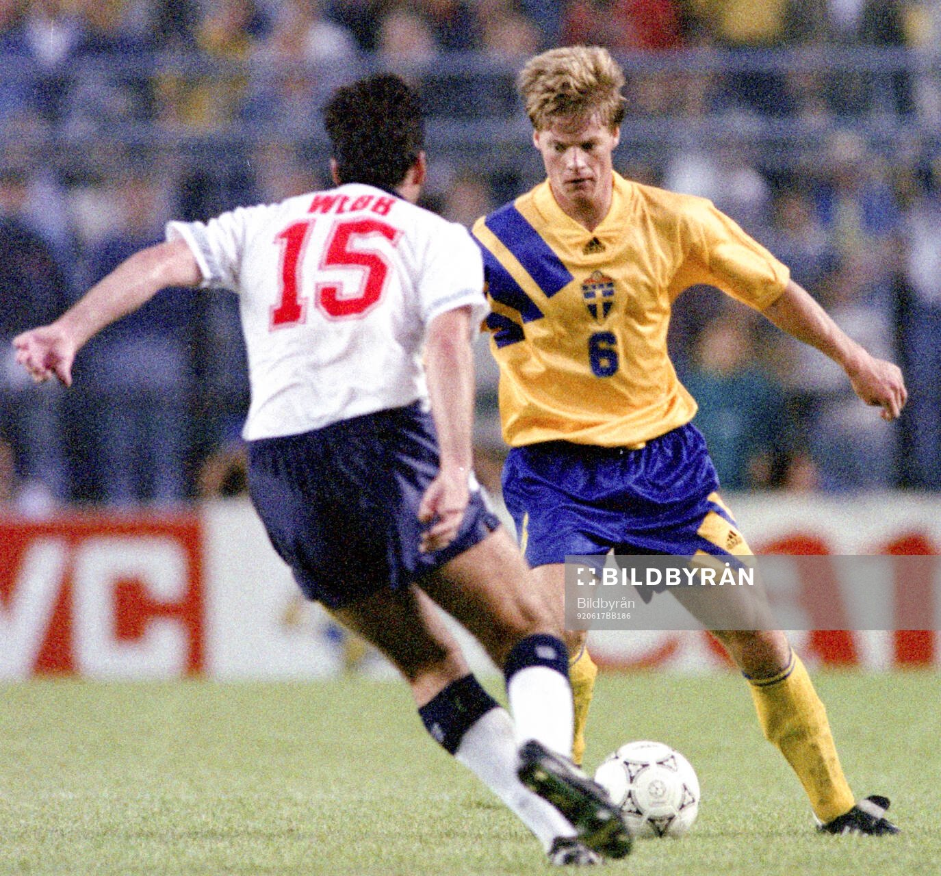 Swedens Stefan Schwarz against Englands Neil Webb