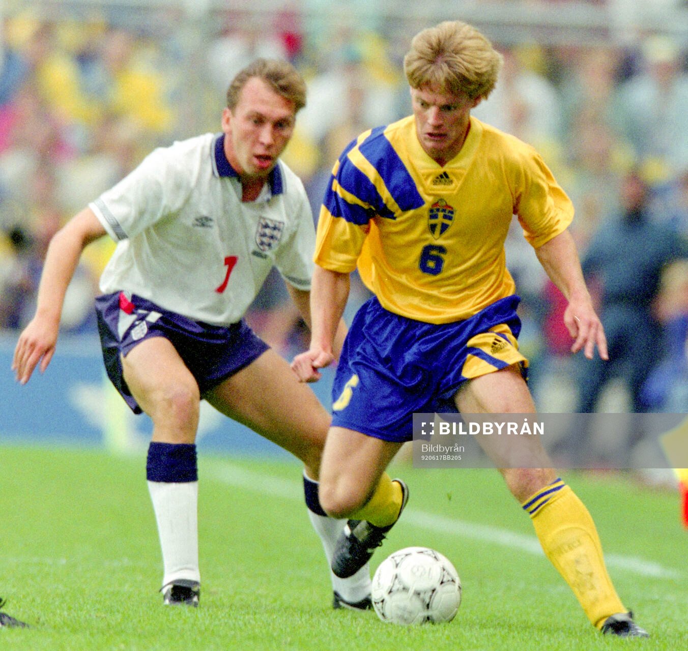 Swedens Stefan Schwarz against Englands David Platt