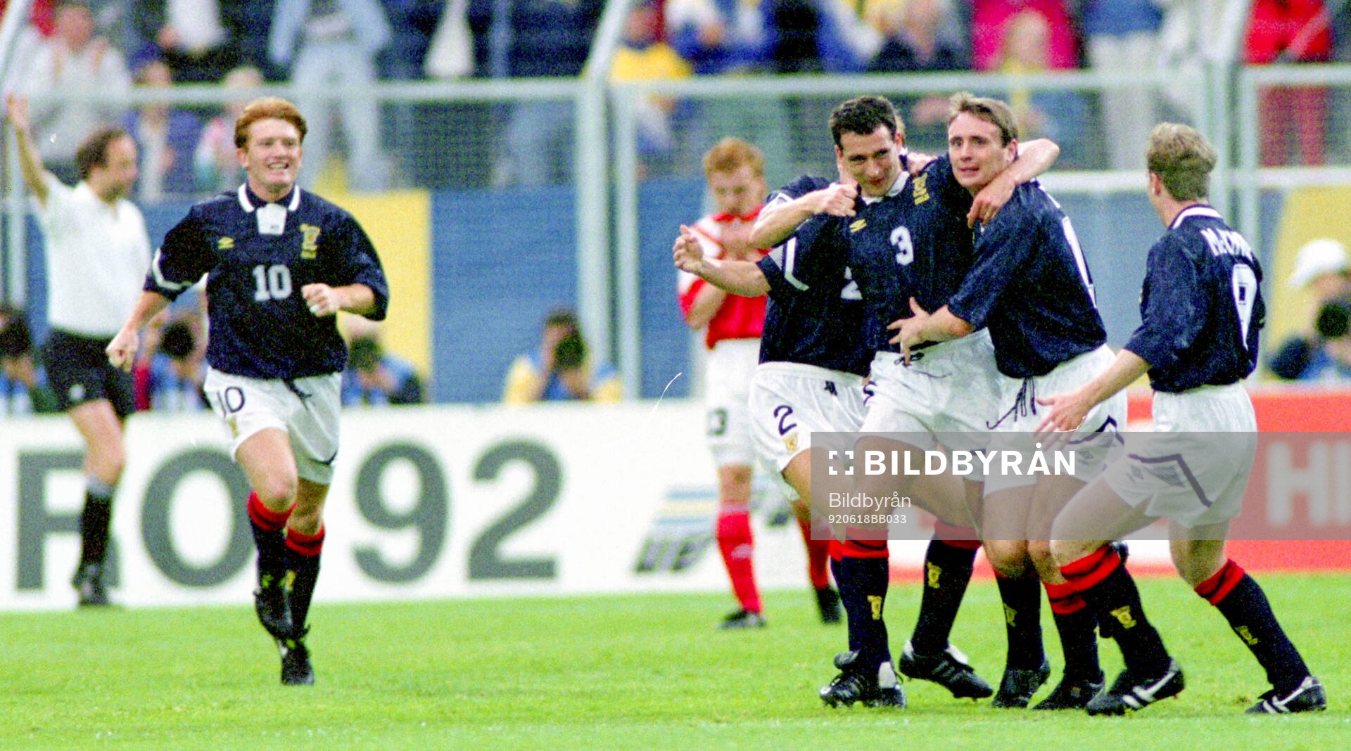 Scotlands Paul McStay (3) celebrates his 1-0 goal with team