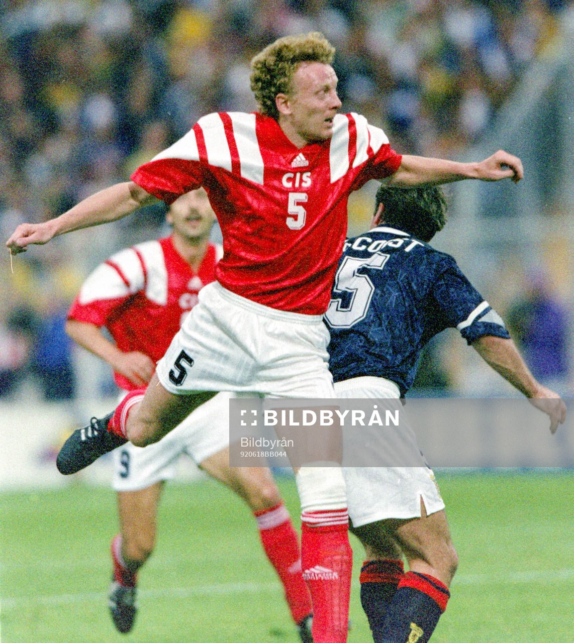Oleg Kuznetsov of CIS against Scotlands Ally McCoist