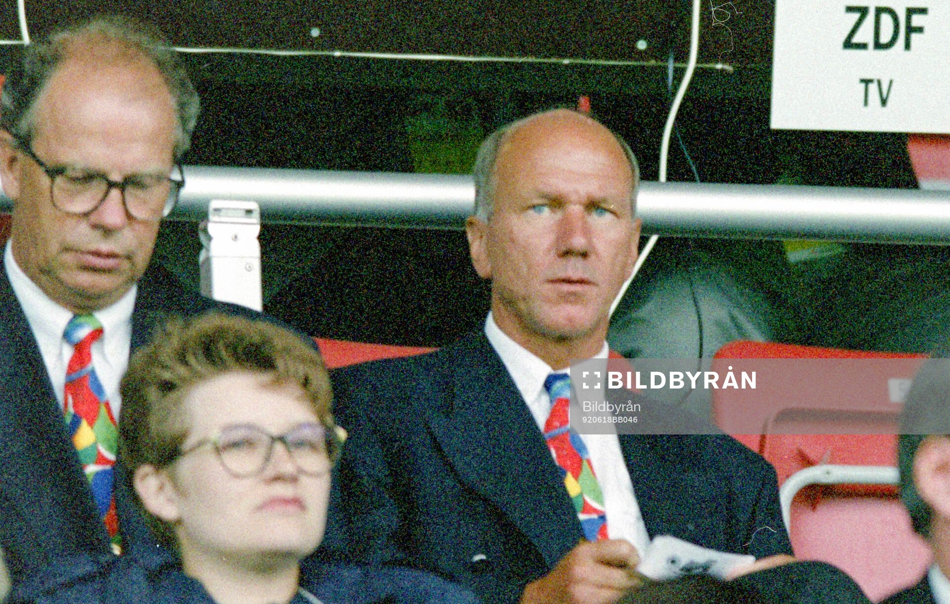 Sweden manager Tommy Svensson (R) watches the game