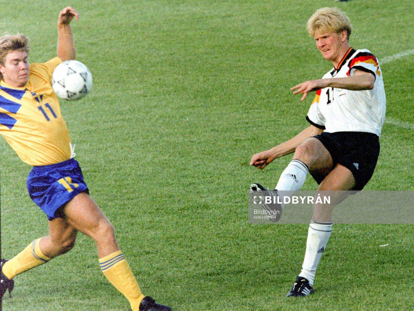 Stefan Effenberg of Germany against Swedens Tomas Brolin