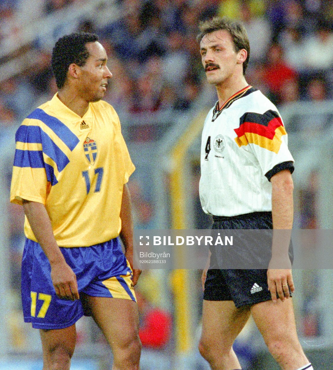 Martin Dahlin of Sweden and Jurgen Kohler of Germany