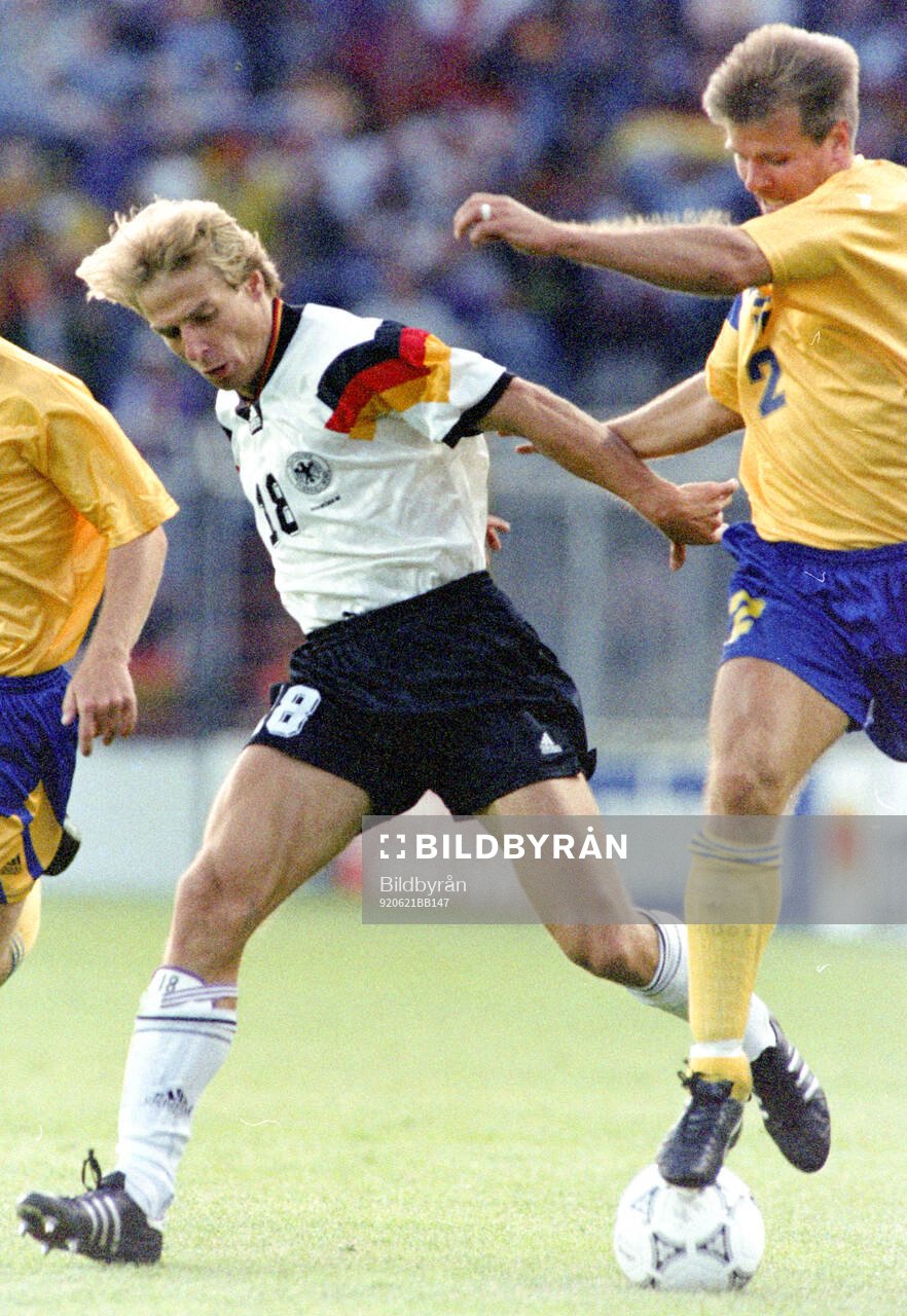 Jurgen Klinsmann of Germany against Roland Nilsson of Sweden
