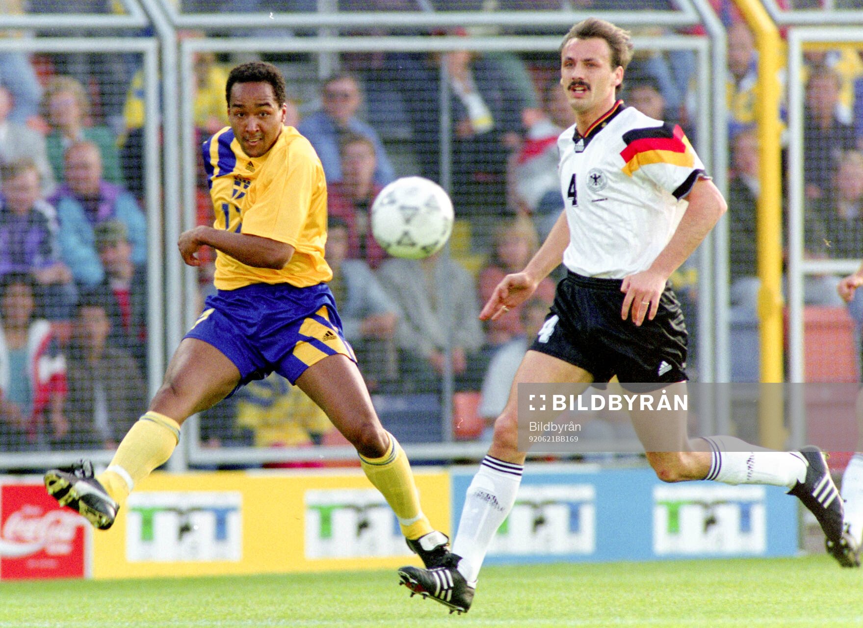 Swedens Martin Dahlin against Germanys Jurgen Kohler