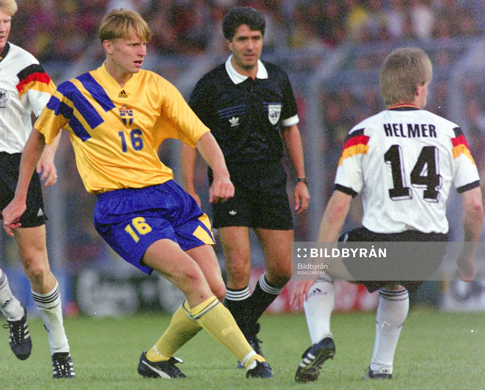 Swedens Kennet Andersson against Germanys Thomas Helmer