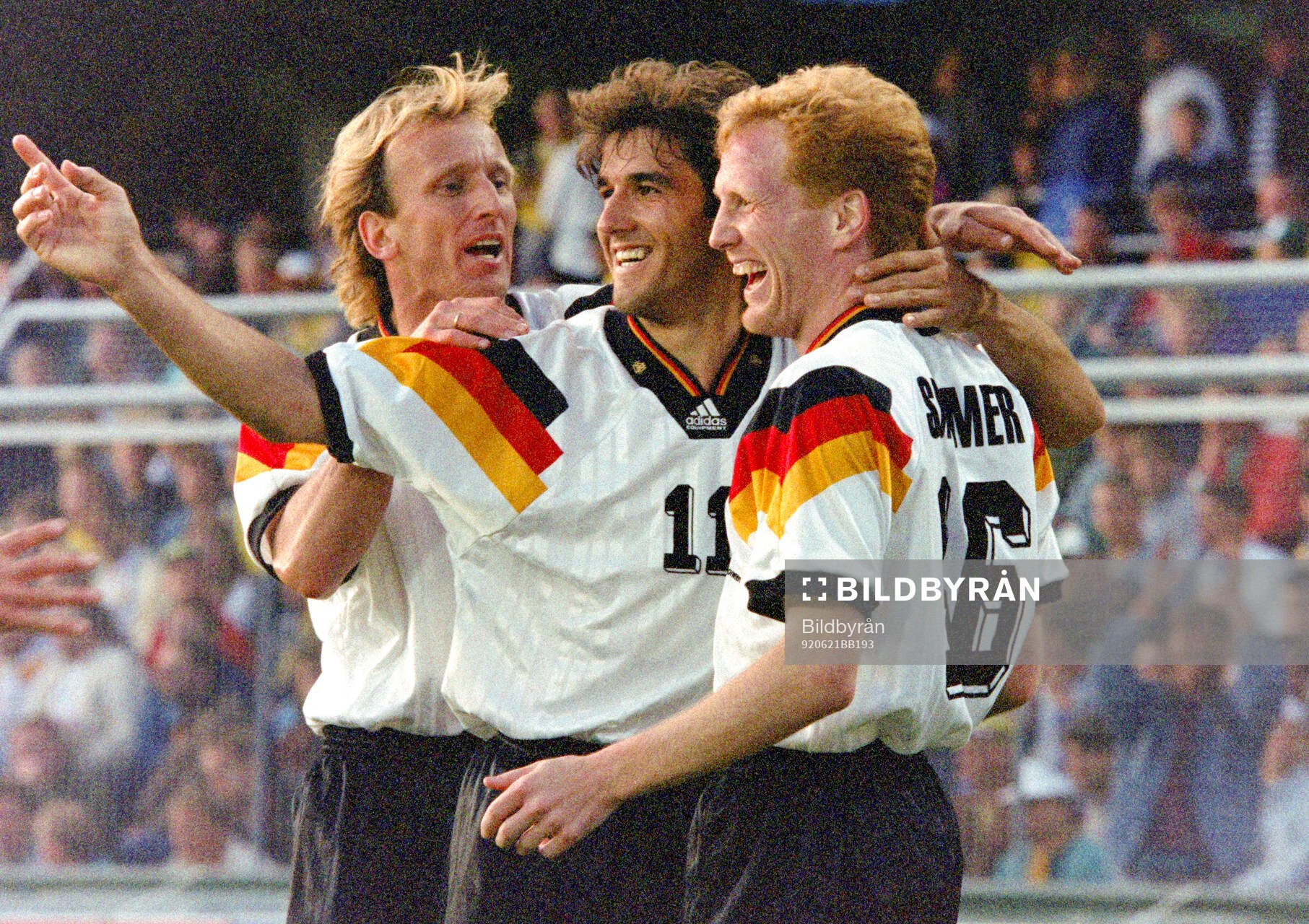 Germanys Karl-Heinz Riedle (C) celebrates his 2-0 goal with