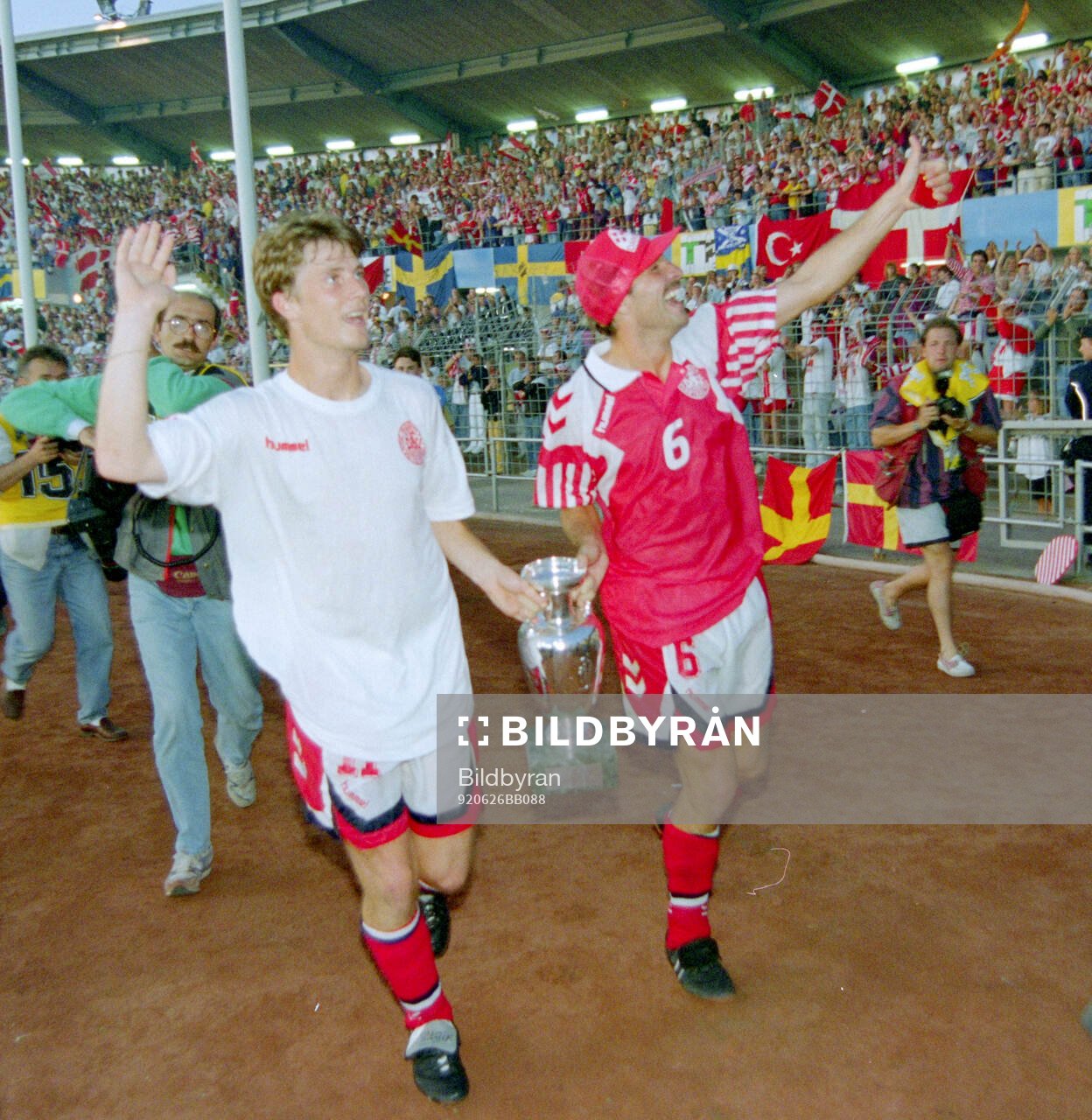 Denmarks Brian Laudrup and Kim Christofte celebrates with