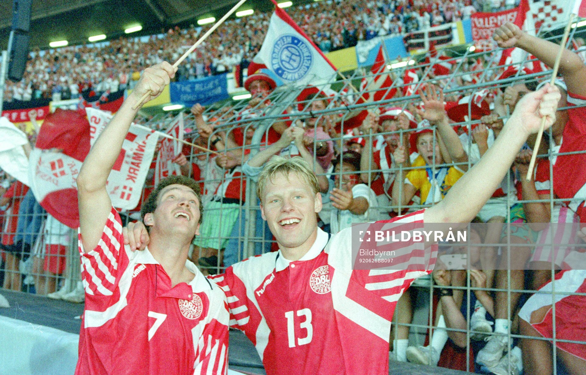 Denmarks John Jensen and Henrik Larsen celebrates