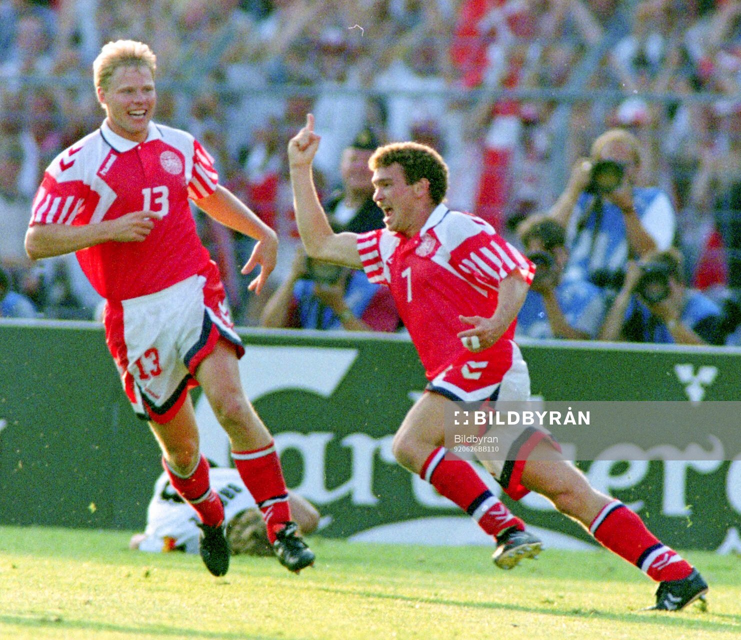 Denmarks John Jensen (R) celebrates with Henrik Larsen