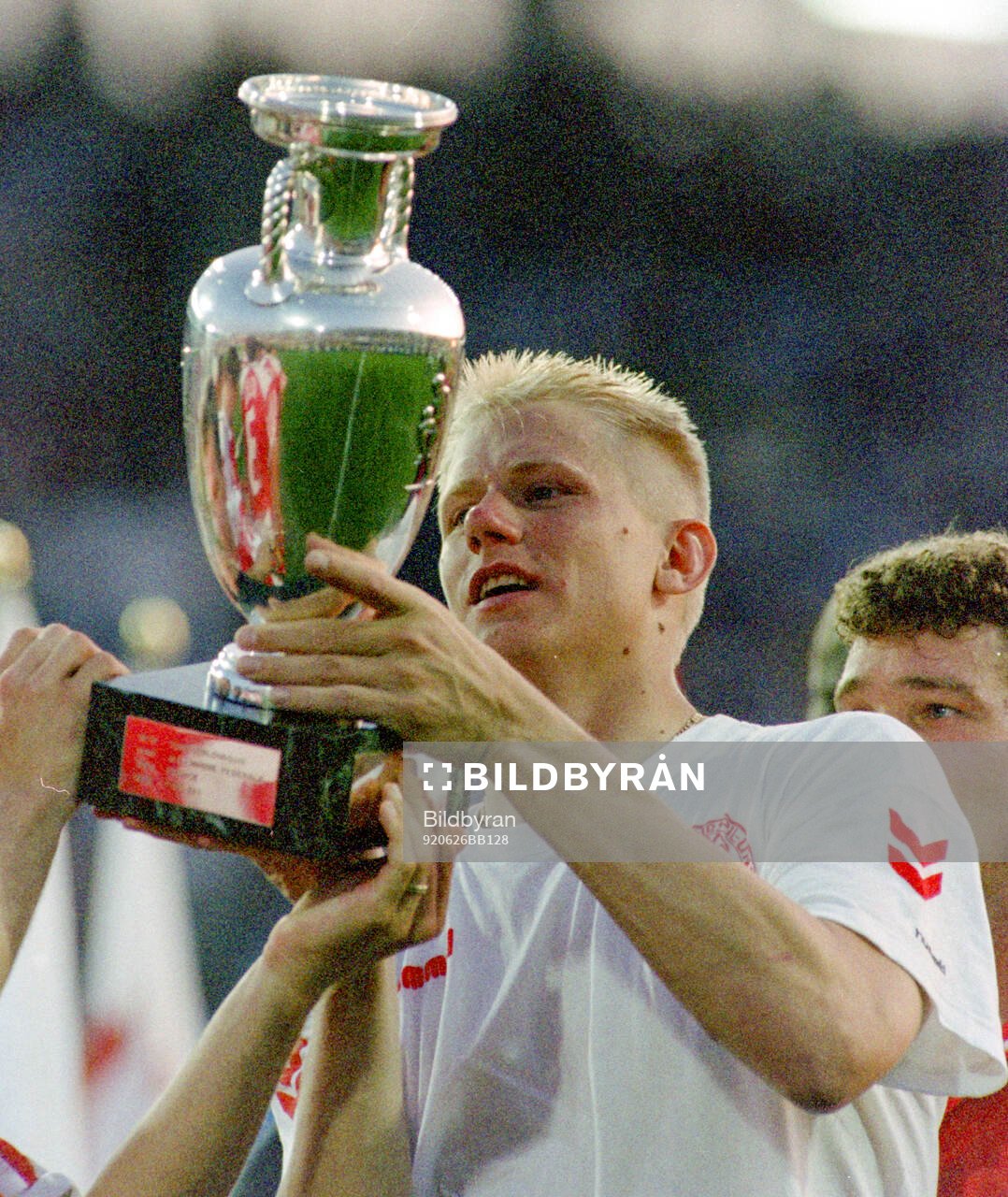 Denmarks Peter Schmeichel celebrates with the trophy