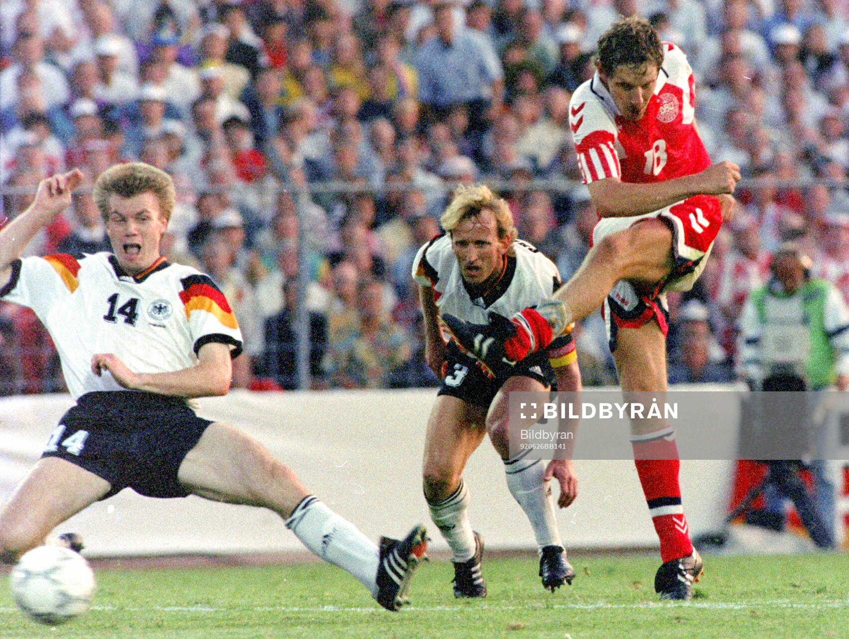 Denmarks Kim Vilfort shoots to score the 2-0 goal, Germanys