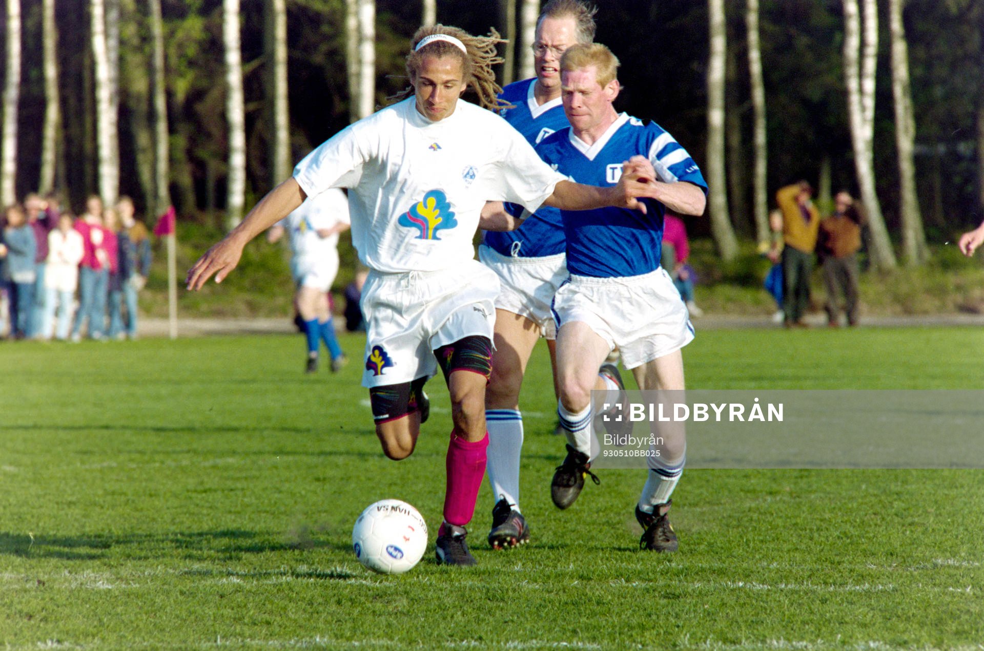 Henrik Larsson med Jan Boklöv och Staffan Ling i ryggen