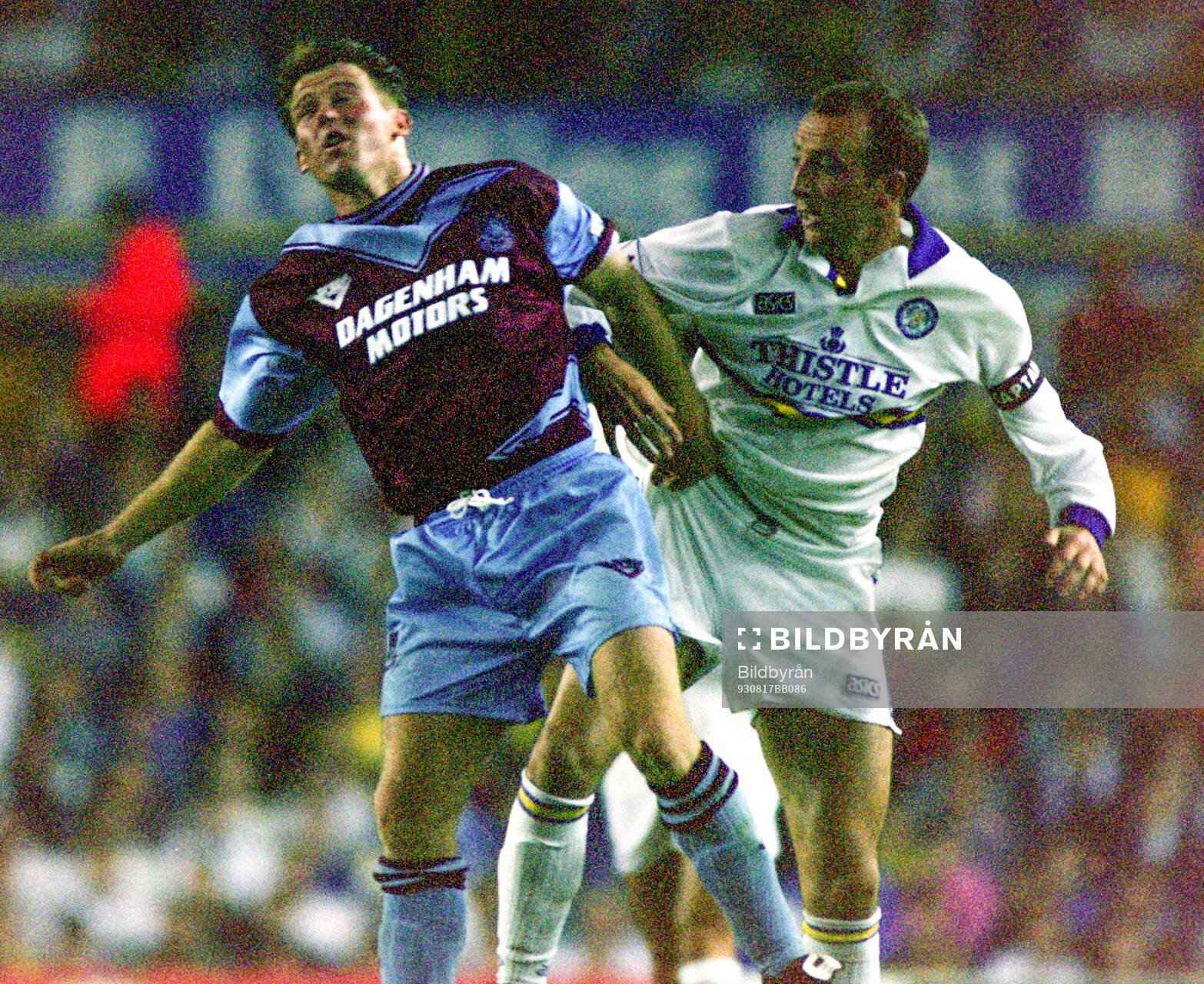 Martin Allen of West Ham (L) against Gary McAllister of