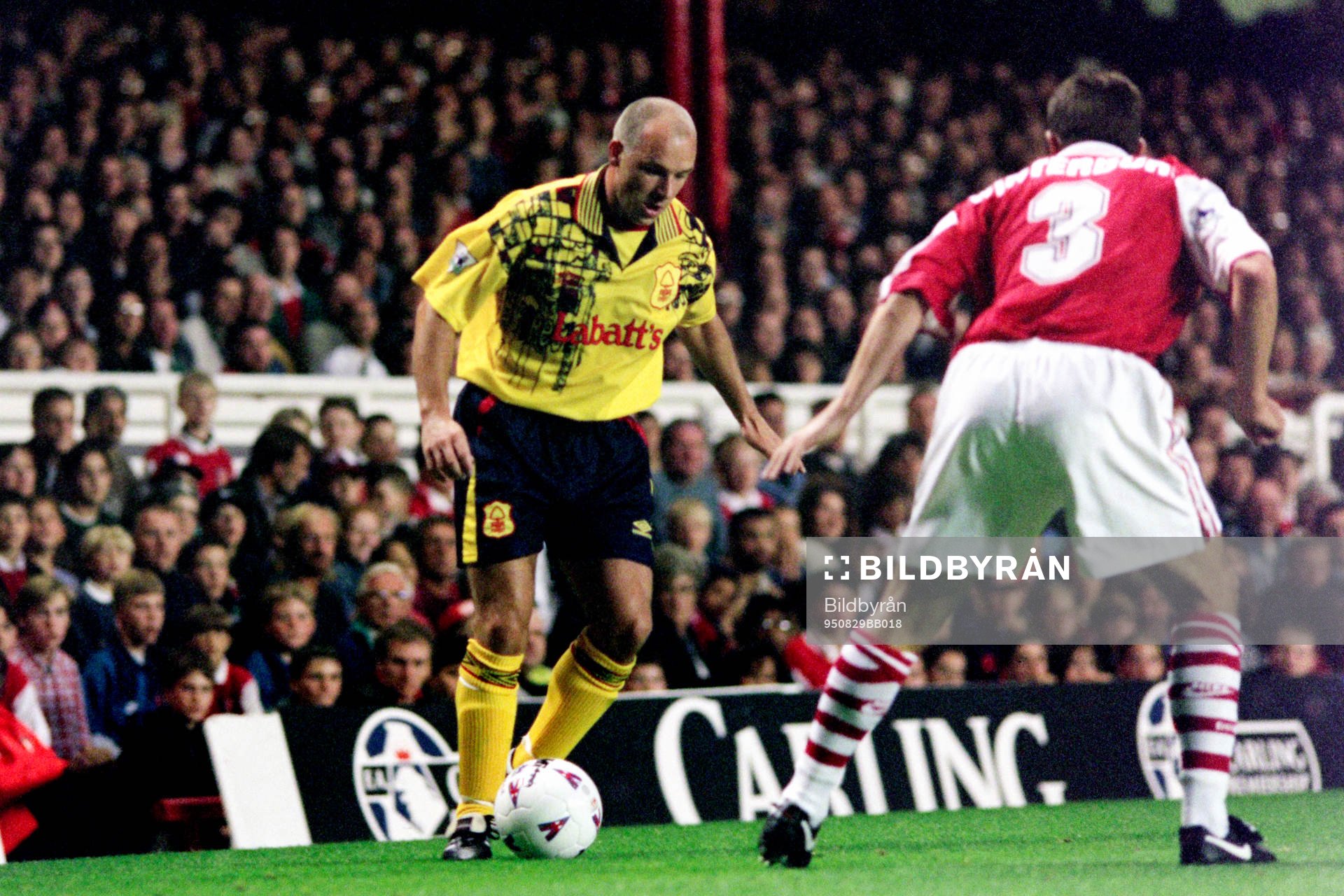 Fotboll, engelsk, Arsenal - Nottingham Forest, 1-1: Steve Stone (Forest), Nigel Winterburn (Arsenal).
