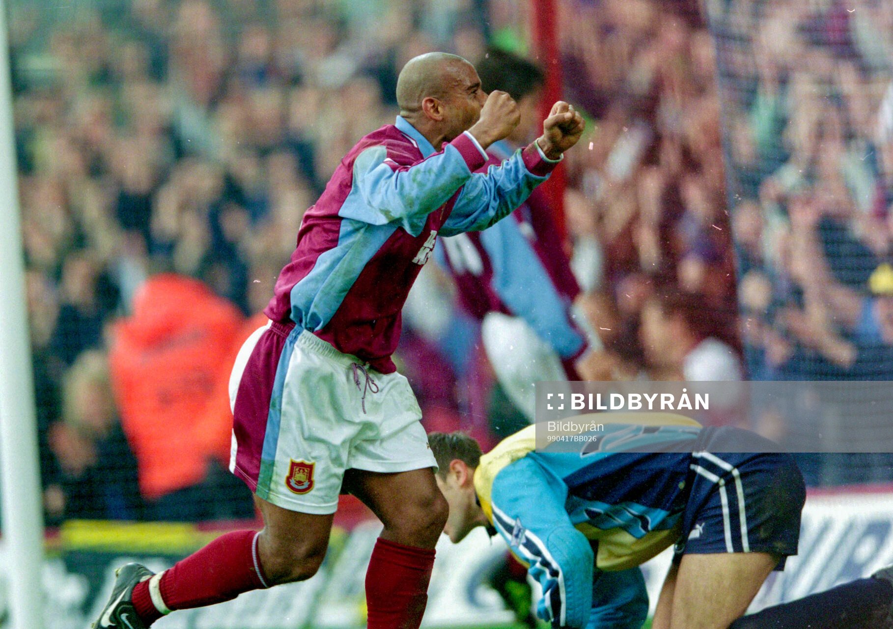 Football, Premier League 1998-1999, West Ham - Derby: Trevor Sinclair of West Ham celebrates his goal behind Derbys Russell Hoult.