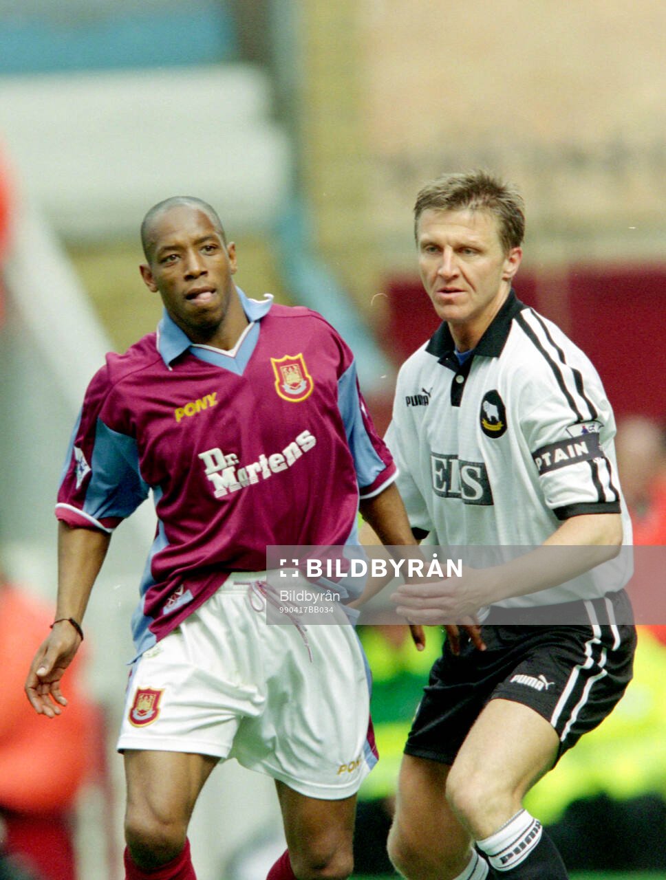 Ian Wright of West Ham against Jacob Laursen of Derby