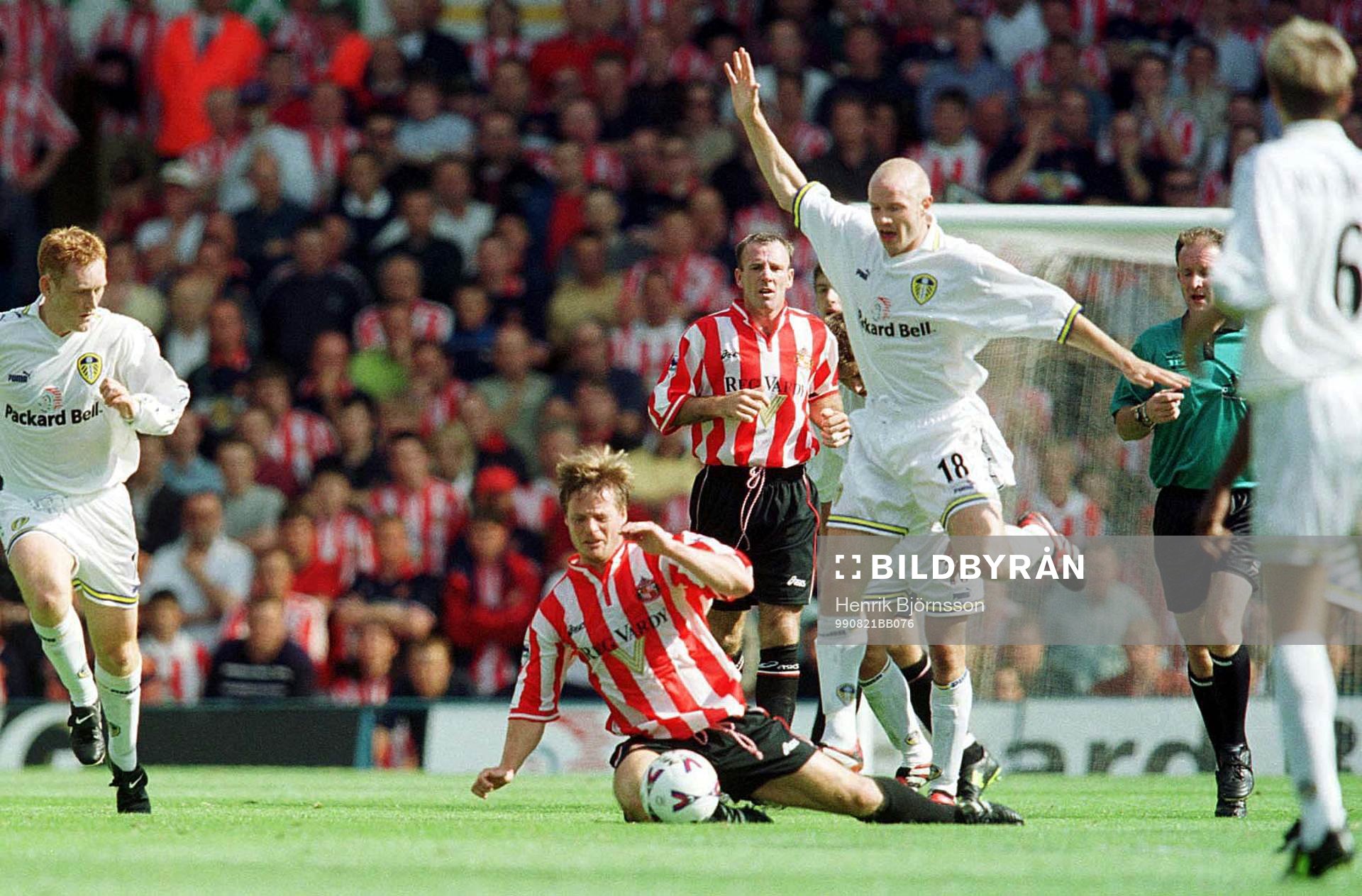 Stefan Schwarz på knä för Danny Mills