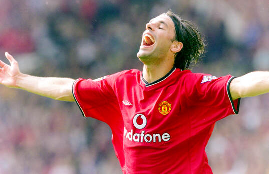  Ruud van Nistelrooy of Manchester United celebrates a goal.