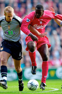  Olof Mellberg, Aston Villa och Emile Heskey, Liverpool.