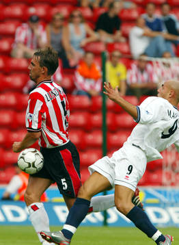   Claus Lundekvam, Southampton och Massimo Maccarone, Middlebrough