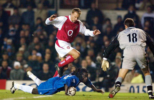   Ferdinand Coly, Birmingham och Dennis Bergkamp, Arsenal 