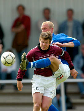  Hannes Tobiasson i duell med en TFF-spelare