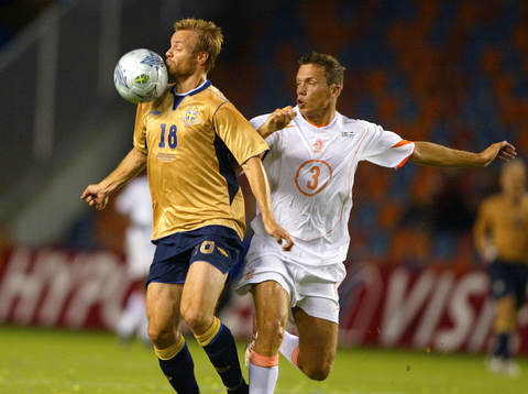 Mattias Jonson, Sverige och Johnny Heitinga, Holland