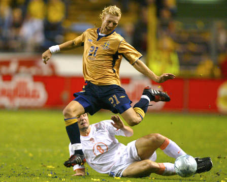  Christian Wilhelmsson, Sverige och Mark van Bommel, Sverige.. 