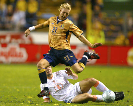  Christian Wilhelmsson, Sverige och Mark van Bommel, Sverige.. 