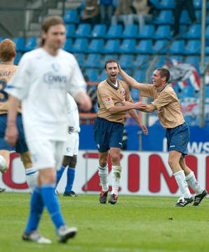  Rade Prica, Rostock, jubel med David Rasmunssen efter sitt 1-0 mål.