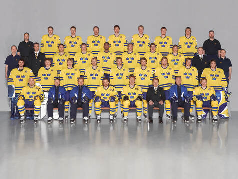 Players and team staff of Sweden pose for a team photo